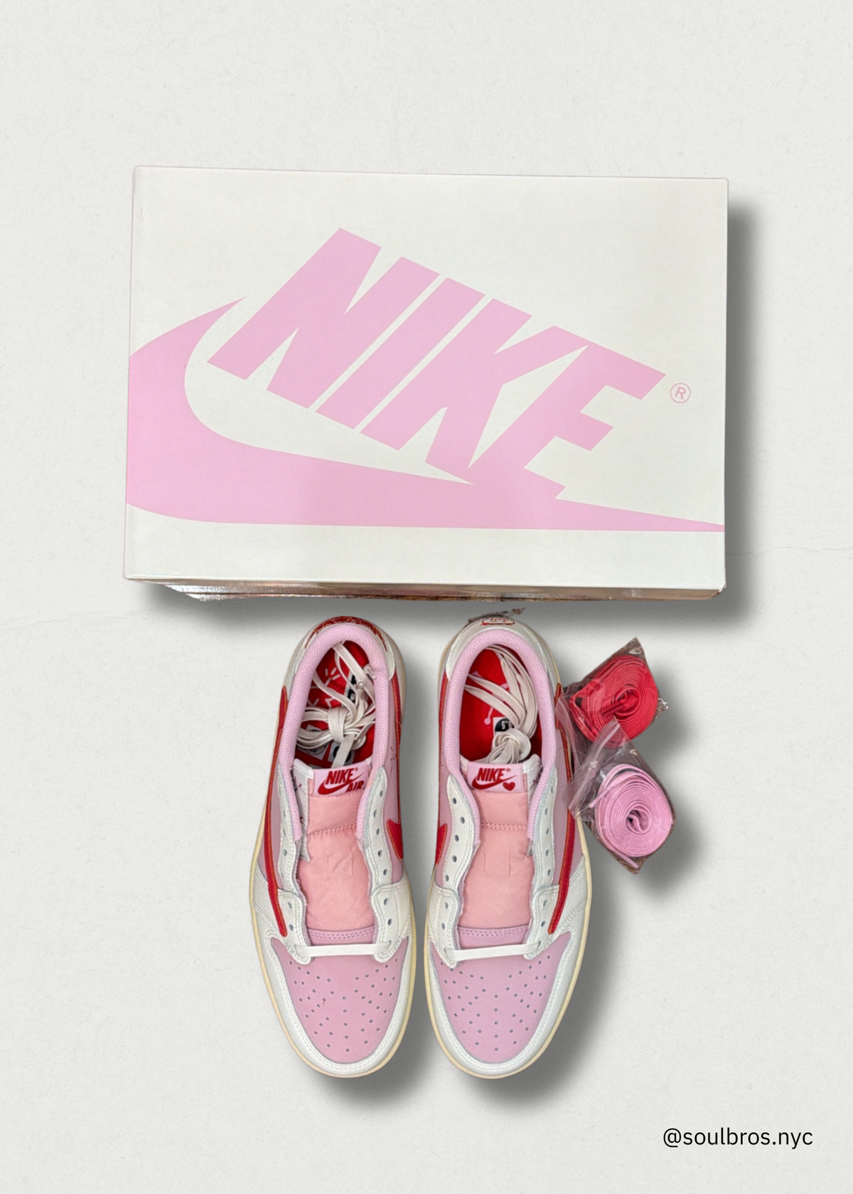 Travis Scott x Air Jordan 1 Low “Sail / Tropical Pink”